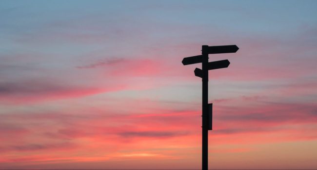 javier-allegue-barros-C7B-ExXpOIE-unsplash Signpost and sunset