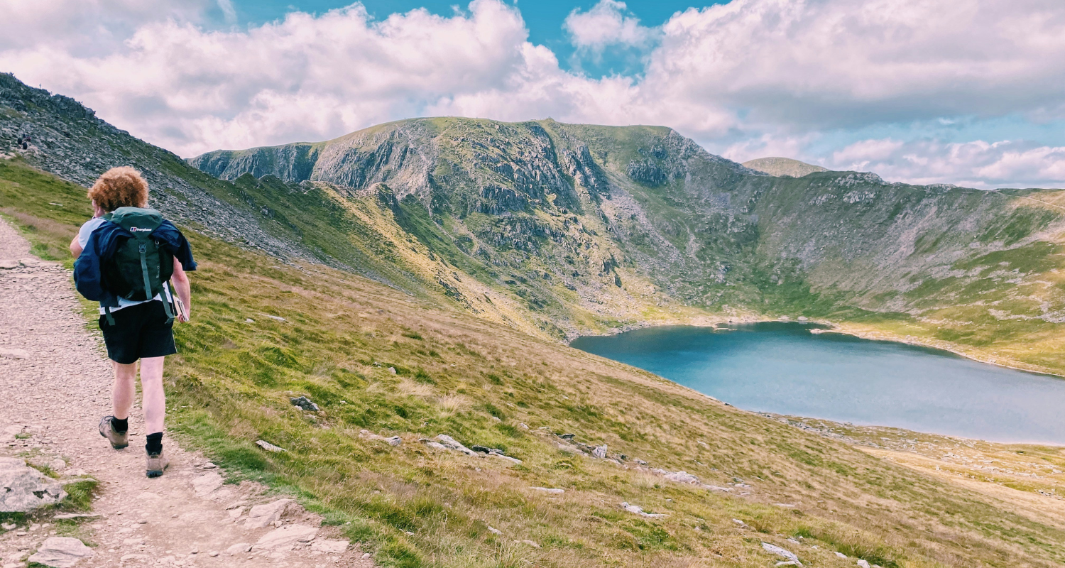 Female hiker walks in Lake District